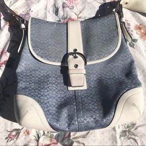 baby blue buckle coach purse with white detail